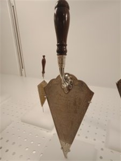 Silver-trowel-presented-to-Mrs-Burdekin-when-laying-memorial-stone-in-Strathfield-24-March-1891-on-display-at-SLNSW-18-July-2024-225x300.jpg