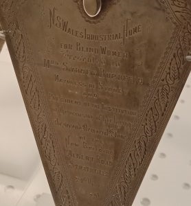 Silver-trowel-presented-to-Mrs-Burdekin-when-laying-memorial-stone-in-Strathfield-24-March-1891-on-display-at-SLNSW-18-July-2024-cropped-278x300.jpg